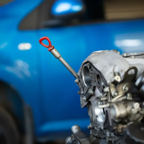 an-auto-mechanic-repairs-an-internal-combustion-en-2025-01-10-21-36-59-utc